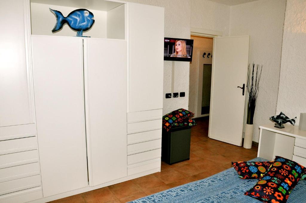 Club Esse Cala Bitta Hotel Baja Sardinia Quarto foto